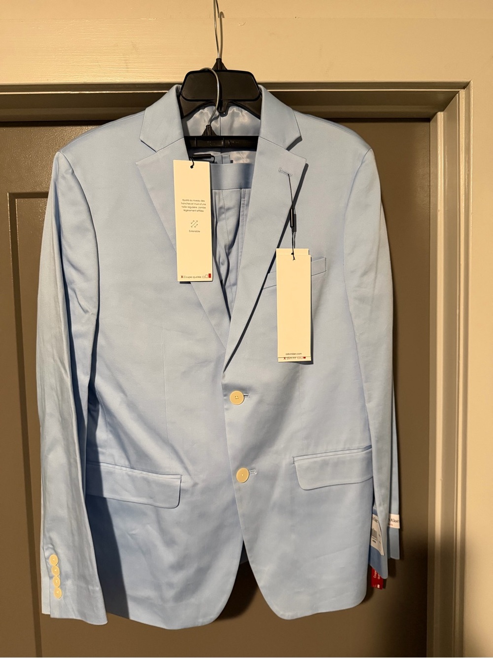 Calvin Klein Light Blue Slim-Fit 2 piece suit 
Blazer 40R 
Pants 32/32